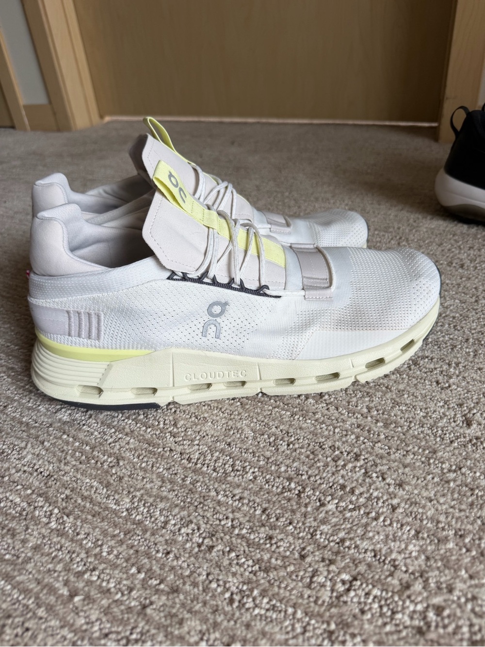 On Running Men’s Sneakers in White with Pale Yellow Accents